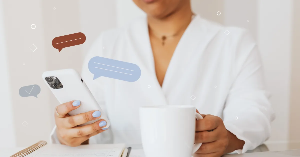 Woman holding a smartphone and a coffee cup, with illustrated chat bubble icons floating around the phone